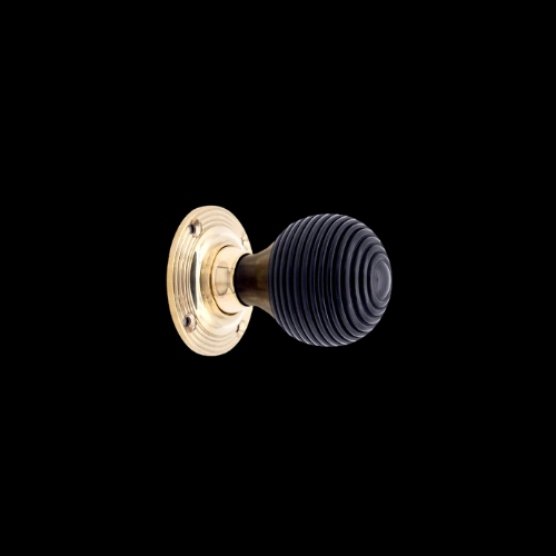 8036 - Ebony Wood beehive door knobs Polished Brass