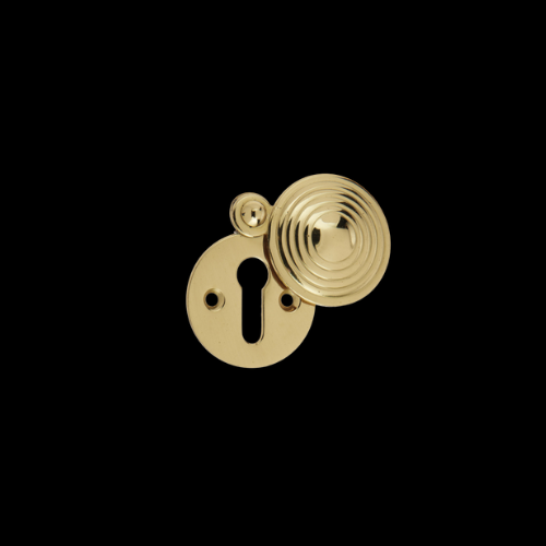1909 - Polished Brass Ridged Covered Escutcheon
