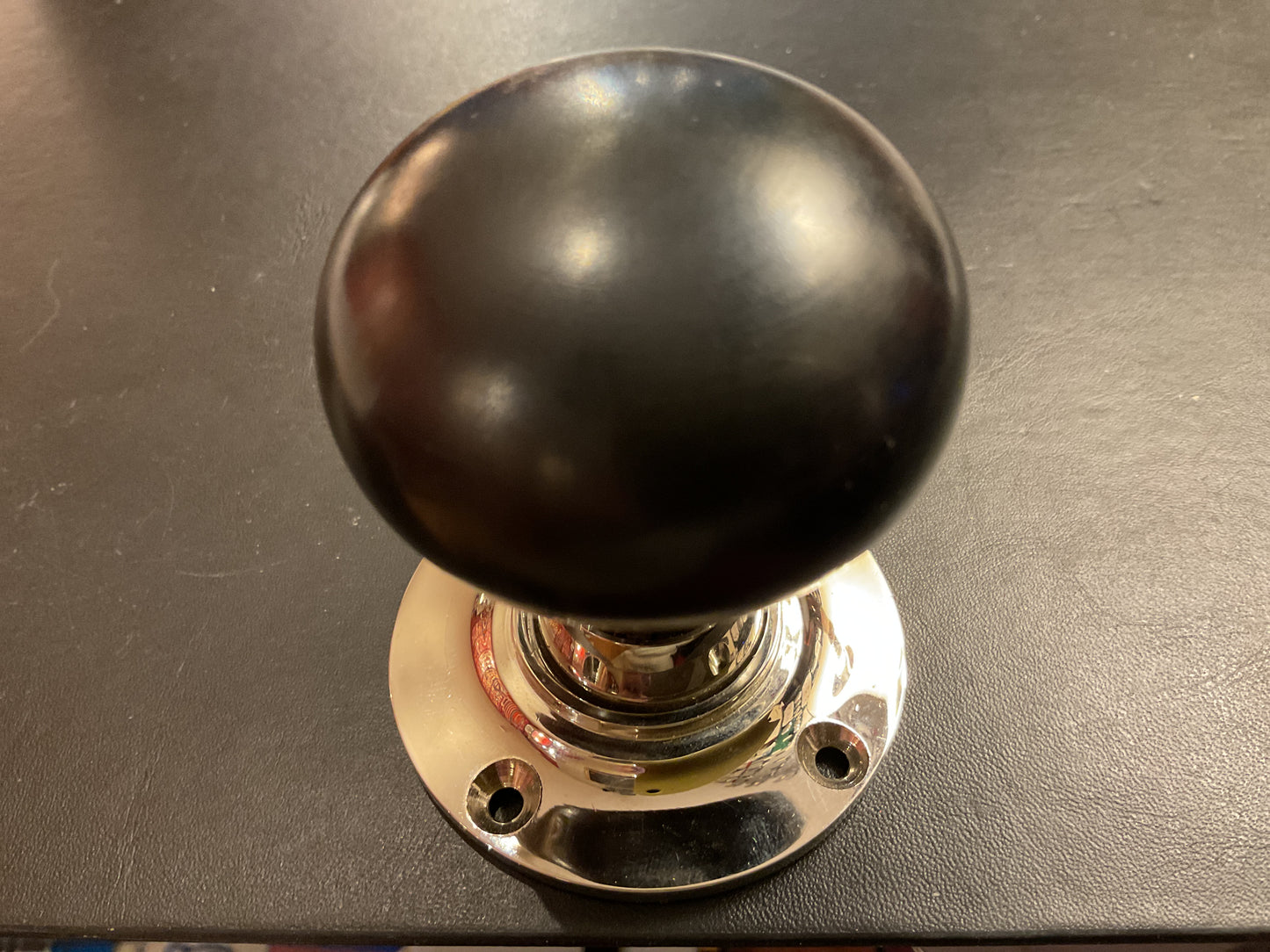 8034 - Ebony Bun 55 mm Door Knobs On Polished Nickel